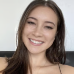 Image of smiling former adolescent student of Kala Baker