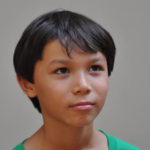 Image of studious former young student of Kala Baker